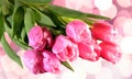 A bouqet of beautiful pink tulips on a bokeh