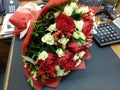 Bouqette of flowers with white and red rose