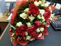 Bouqette of flowers with white and red rose