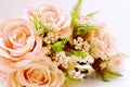 Bouquet of artificial pink coral roses,  home decor or Wedding floral arrangement Royalty Free Stock Photo