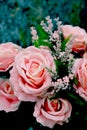 Bouquet of artificial pink roses,  home decor or Wedding floral arrangement Royalty Free Stock Photo