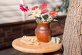 A bouquet of autumn dahlias on a wooden table in the garden. Royalty Free Stock Photo