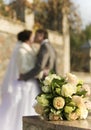 Bouquet on a background a groom and fiancee Royalty Free Stock Photo