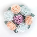 Bouquet, basket of flowers kanzashi from satin ribbons. Japanese traditional handmade decorations, pastel colors Royalty Free Stock Photo