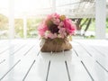 Bouquet of beautiful artificial flowers on white wooden table Royalty Free Stock Photo