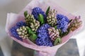 Bouquet of Beautiful blue and lilac hyacinths. Close-up spring flowers in vase. bulbous plant. Floral wallpaper Royalty Free Stock Photo