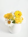 Bouquet of beautiful daisies on white background. Festive spring or summer card. Congratulations on mother`s day. Women`s Day.