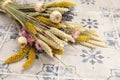 Bouquet of beautiful dried flowers plants - chrysanthemums, lavender, poppies, wheat spikelets in the greek flowers bar.