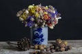 Bouquet beautiful dried flowers in a vintage vase Royalty Free Stock Photo