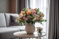 A bouquet of beautiful flowers in a vase on the table in the living room. Interior design, decoration concept Royalty Free Stock Photo