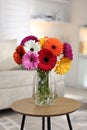 Bouquet of beautiful gerbera flowers on table at home Royalty Free Stock Photo