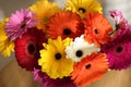 Bouquet of beautiful gerbera flowers on table indoors, closeup Royalty Free Stock Photo