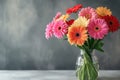 Bouquet of beautiful gerbera flowers in vase on table Royalty Free Stock Photo