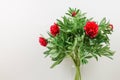 Bouquet of beautiful pink peonies in a glass vase.