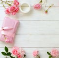 Bouquet of beautiful pink roses and gift in pink packing Royalty Free Stock Photo