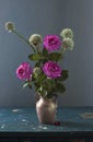 Bouquet of beautiful roses in a vase on a table