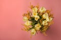 Bouquet with beautiful tulips and mimosa flowers on pink background, top view. Space for text Royalty Free Stock Photo