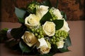 bouquet for bridesmaids and bridesmaids with cream roses and lots of green leaves Royalty Free Stock Photo