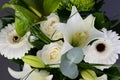 Bouquet bunch of beautiful white flowers with white roses, lily and daisy Royalty Free Stock Photo