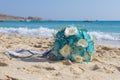 Bouquet bunch of flowers on a tropical sandy beach Royalty Free Stock Photo