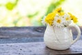 Bouquet of Chrysanthemum in a white mason jars.Vintage style photography