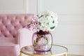 Bouquet colorful hydrangeas in vintage glass vase on coffee table in white room. Copy space. Flowers in vase at home. Home cozy in Royalty Free Stock Photo