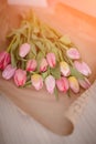 A bouquet of colorful spring tulips wrapped in a craft paper Royalty Free Stock Photo