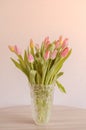 A bouquet of colorful spring tulips wrapped in a craft paper Royalty Free Stock Photo