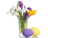 Bouquet from crocus flowers in vase and easter eggs Royalty Free Stock Photo