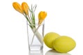 Bouquet from crocus flowers in vase and easter eggs Royalty Free Stock Photo