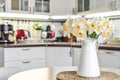 Bouquet of daffodils in interior of the kitchen Royalty Free Stock Photo