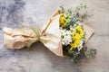 Bouquet daisy chamomile flowers on wooden garden table.