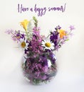 Bouquet of delphinium, chamomile and daylily. Flowers in a bouquet of country style in a glass vase. Royalty Free Stock Photo