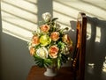 Bouquet of fake artificial roses in a vase set on a wooden chair with louvered sunlight. Royalty Free Stock Photo