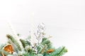 a bouquet of fir branches reinforced with a snowman, Christmas toys, dried oranges and white candles. christmas bouquet Royalty Free Stock Photo