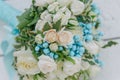 Bouquet of flowers. The bride's bouquet. Bridal bouquet. Floristics. Wedding rings Royalty Free Stock Photo