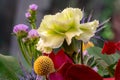 Bouquet of flowers with centre yellow carnation