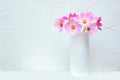 Bouquet of flowers Cosme in a white vase. Royalty Free Stock Photo