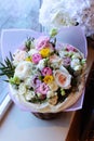 Bouquet of flowers on a leg in the interior of the restaurant for a celebration shop floristry or wedding salon