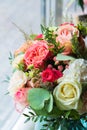 Bouquet of flowers on a leg in the interior of the restaurant for a celebration shop floristry or wedding salon