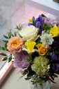 Bouquet of flowers on a leg in the interior of the restaurant for a celebration shop floristry or wedding salon