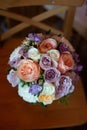 Bouquet of flowers on a leg in the interior of the restaurant for a celebration shop floristry or wedding salon Royalty Free Stock Photo