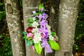 Bouquet of Flowers in Memory of the Victims of the Bosnian Cicil War. Attached to a Tree in Plitvice Lakes National Park, Croatia Royalty Free Stock Photo