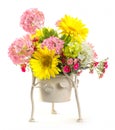 Bouquet of flowers in steel bucket Royalty Free Stock Photo