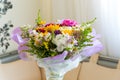 Bouquet of flowers on table in the room Royalty Free Stock Photo