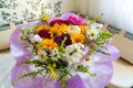 Bouquet of flowers on table in the room Royalty Free Stock Photo