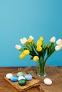 bouquet of flowers in a vase easter eggs holiday decoration tradition Royalty Free Stock Photo