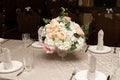 a bouquet of flowers in vase on served tables at the wedding. banquet concept Royalty Free Stock Photo