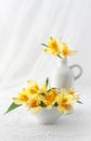 Bouquet of flowers on a white lace tablecloth