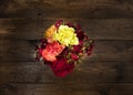 Bouquet of flowers on a wooden table background. Vintage floral background with spring flowers Royalty Free Stock Photo
